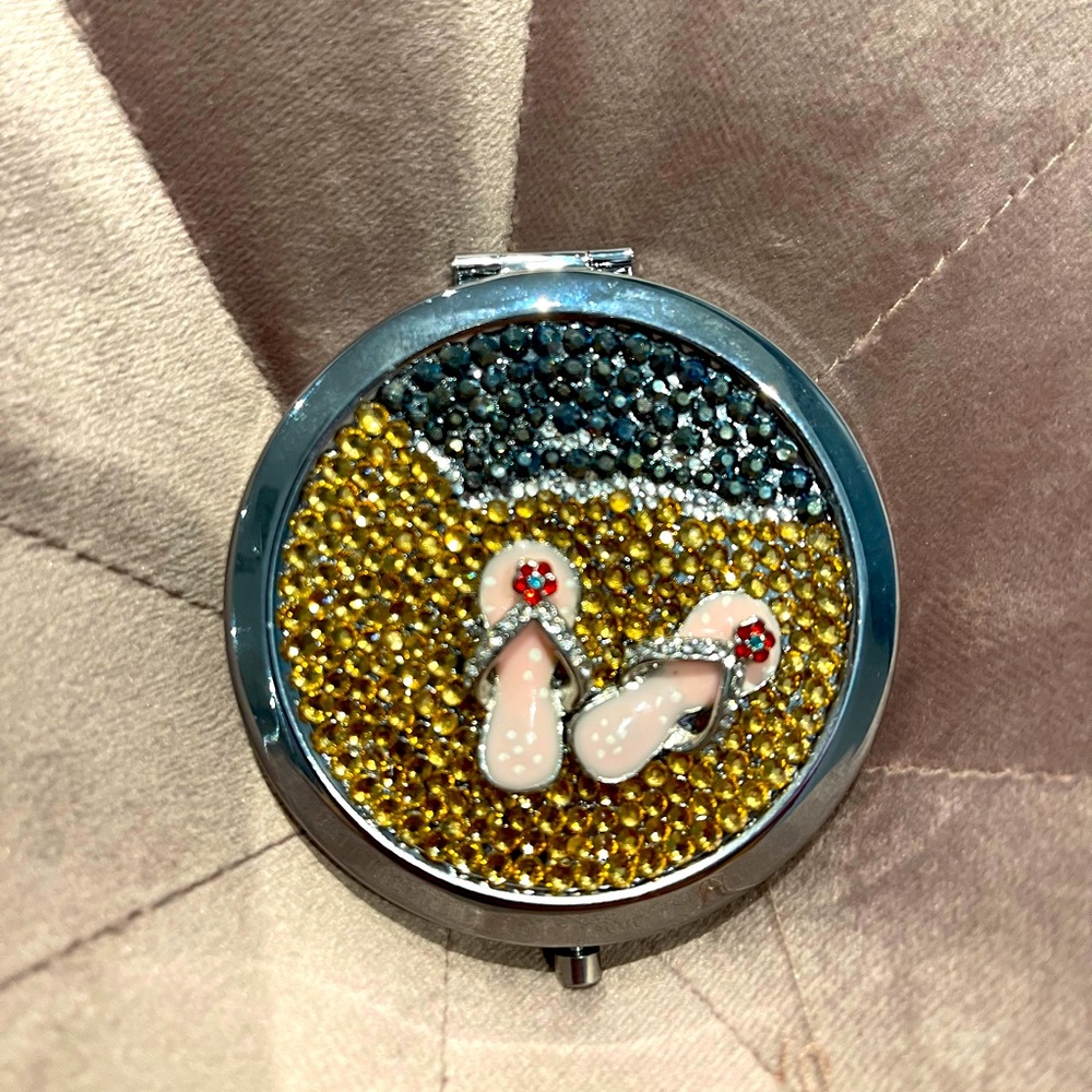 Silver compact mirror